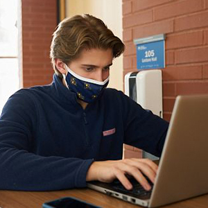 Image of a student wearing a mask at La Salle University.