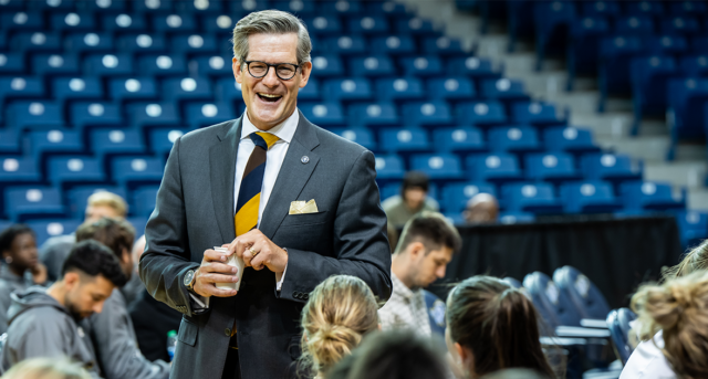 President Dan Allen, Ph.D., speaks with students during a recent University event welcoming La Salle’s Vice President of Athletics & Recreation and Director of Athletics Ashwin “Ash” Puri.