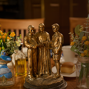 Image of a brass statue on a dining table