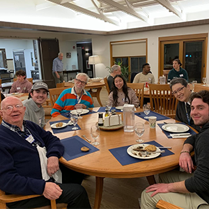 Image of students dining with Christian Brothers
