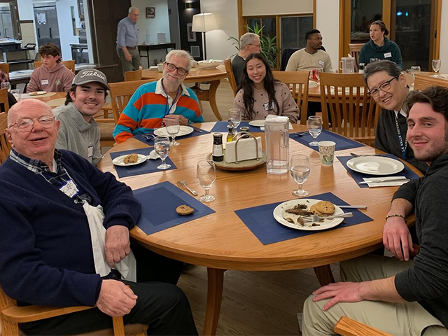 Image of students dining with the Christian Brothers in Anselm Hall