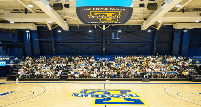 Image of students in the arena