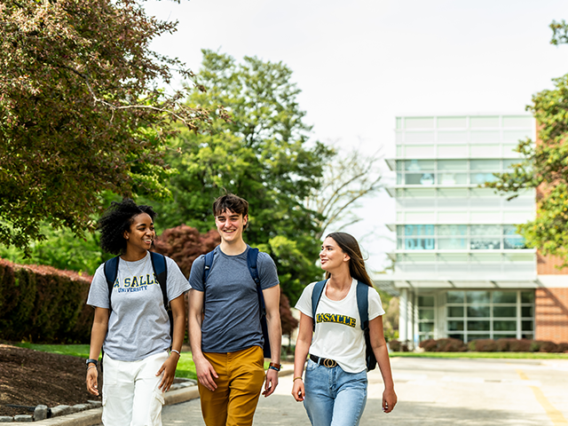 Image of students walking around campus