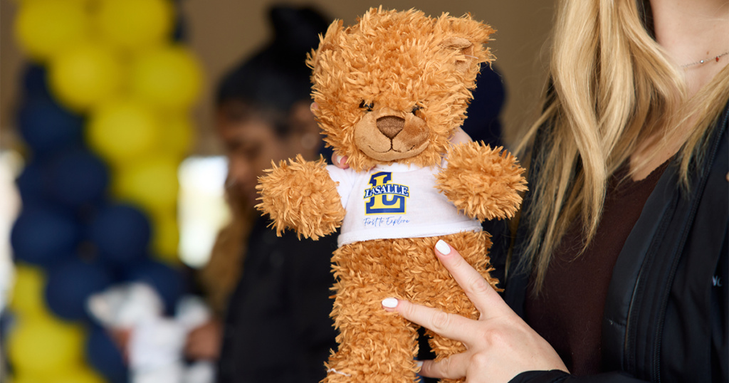 A First to Explore bear for the 2024 First Gen Week Build-A-Bear event.