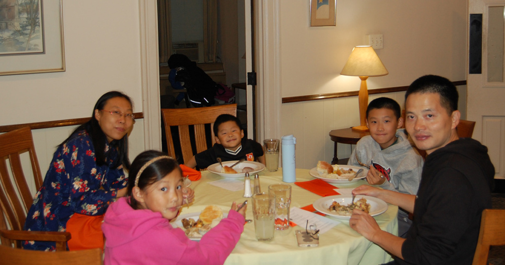 The Yang Family. Mom and Dad are on the faculty. Their three children have added a special extra feel to the celebration for the third year running.