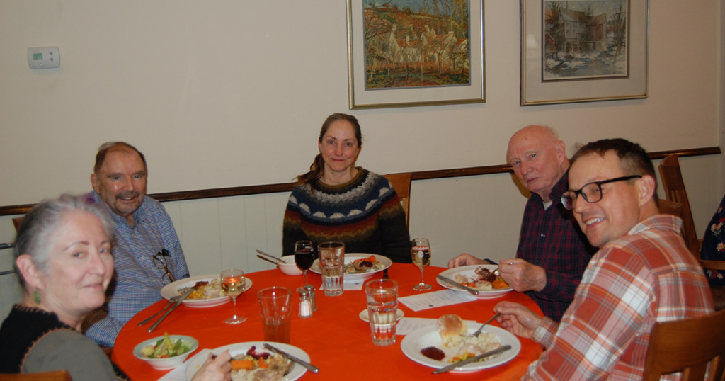 An emeritus professor, the current University chaplain, a Brother from the Community and an ROTC prof with spouse add a sense of wisdom to the crowd.