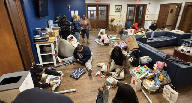 La Salle students wrapping gifts for the 2025 Toy Drive.