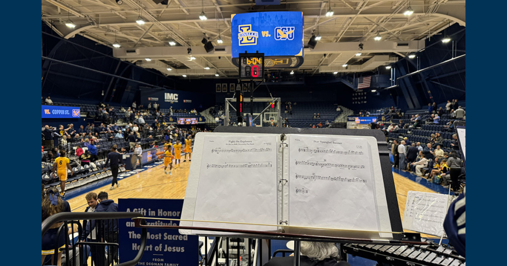 The view from the stands for the Pep Band's electric violinist, Erin Maldonado, '29.
