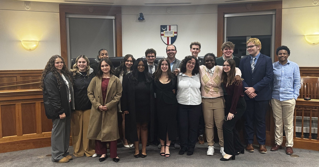 Erin Maldonado, '29, (front row, third from right) with the Mock Trial Team at a tournament in Washington, D.C.,
