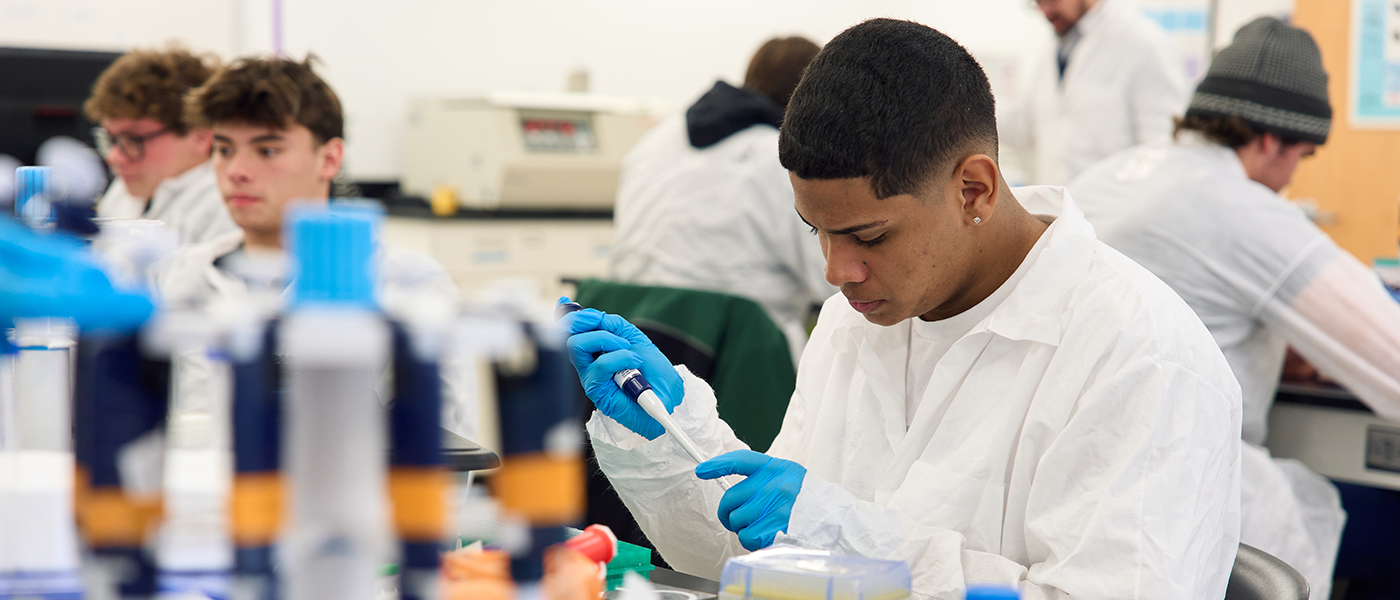 Image of a student working in a science lab