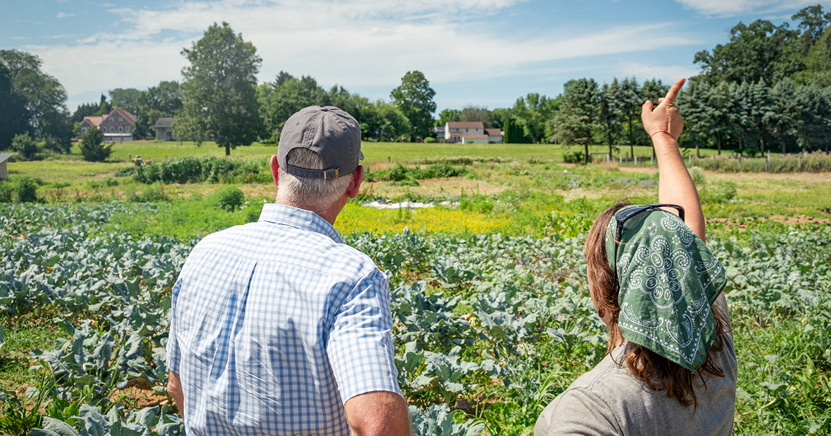 Liz Wagner, '11, (right) with Pennsylvania Secretary of Agriculture, Russell Redding, who toured Crooked Row in July 2025.