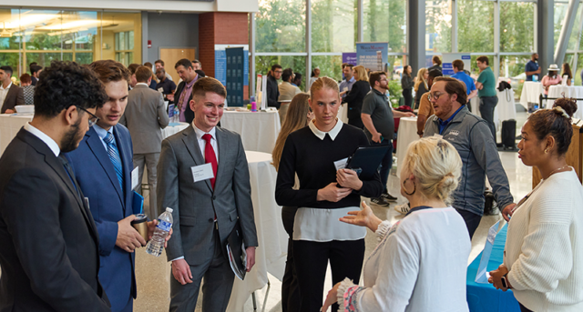 Image of students talking to employers