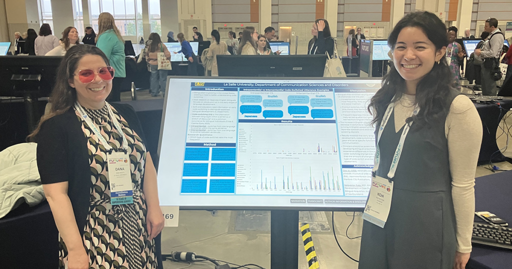 Koh McGinn, '26, M.A. '27, (right) presenting research at the 2025 ASHA Conference with her advisor, Dana Bitetti, Ph.D., CCC-SLP.