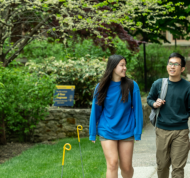 Image of students walking around campus