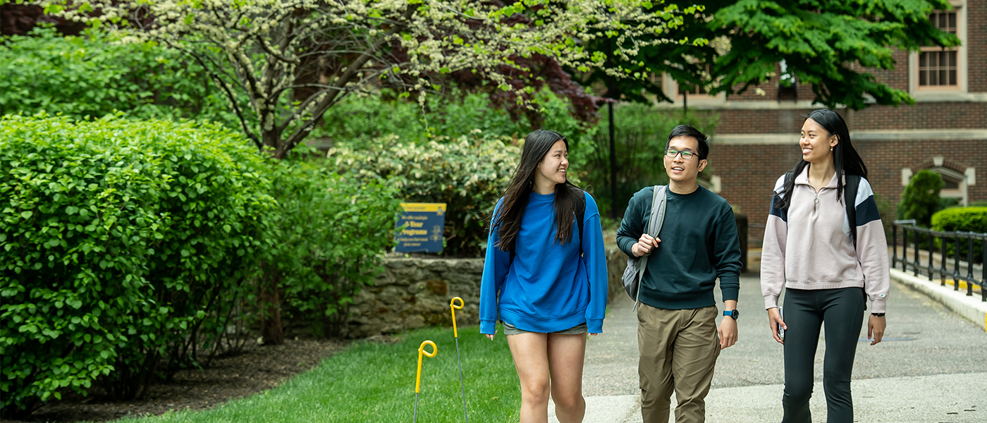 Image of students walking around campus