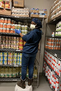 Adia Brown, '27, MPH '28, doing volunteer work.