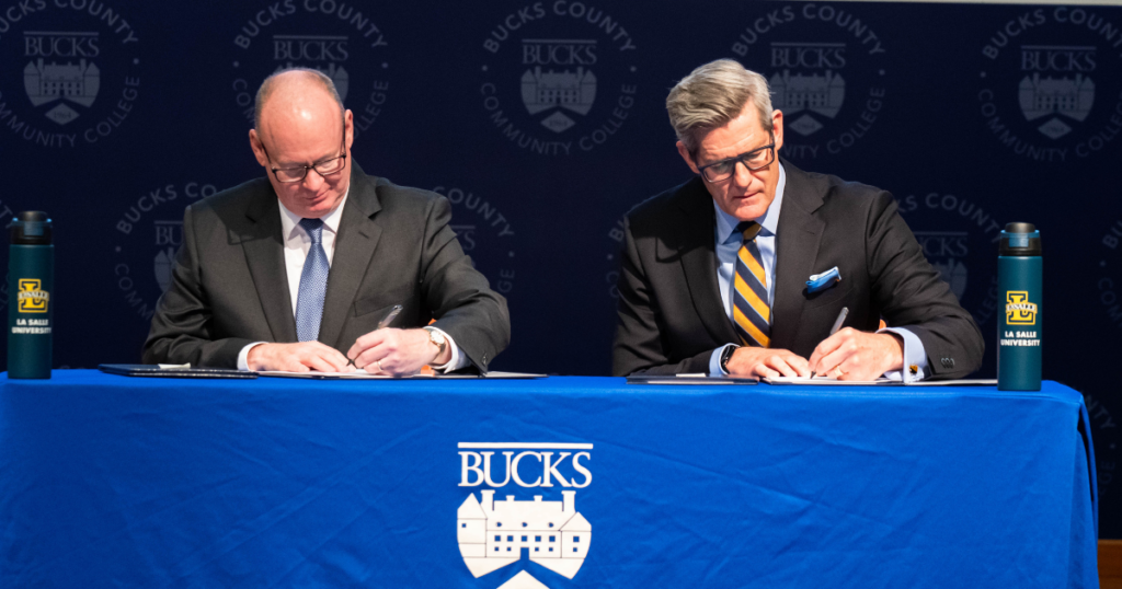 Presidents of Bucks and La Salle sign documents