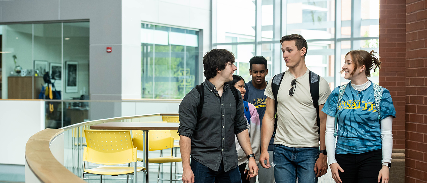 Image of students walking around Founders hall
