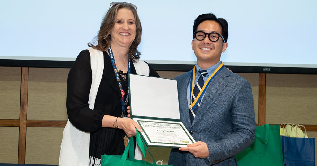 Dang Nguyen, '26, receiving her DAISY Award at La Salle University's 2026 Nurse Pinning Ceremony.