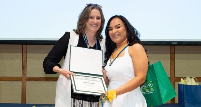 Nathalie Torres, '26, receiving her DAISY Award at La Salle University's 2026 Nurse Pinning Ceremony.