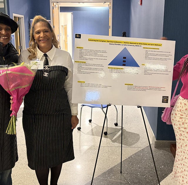 Stacey Chandler, MSW '26 (center) at her capstone project presentation with her mother, Lorna Kaplan, '06, and her daughter, Lorna Chandler, '24.