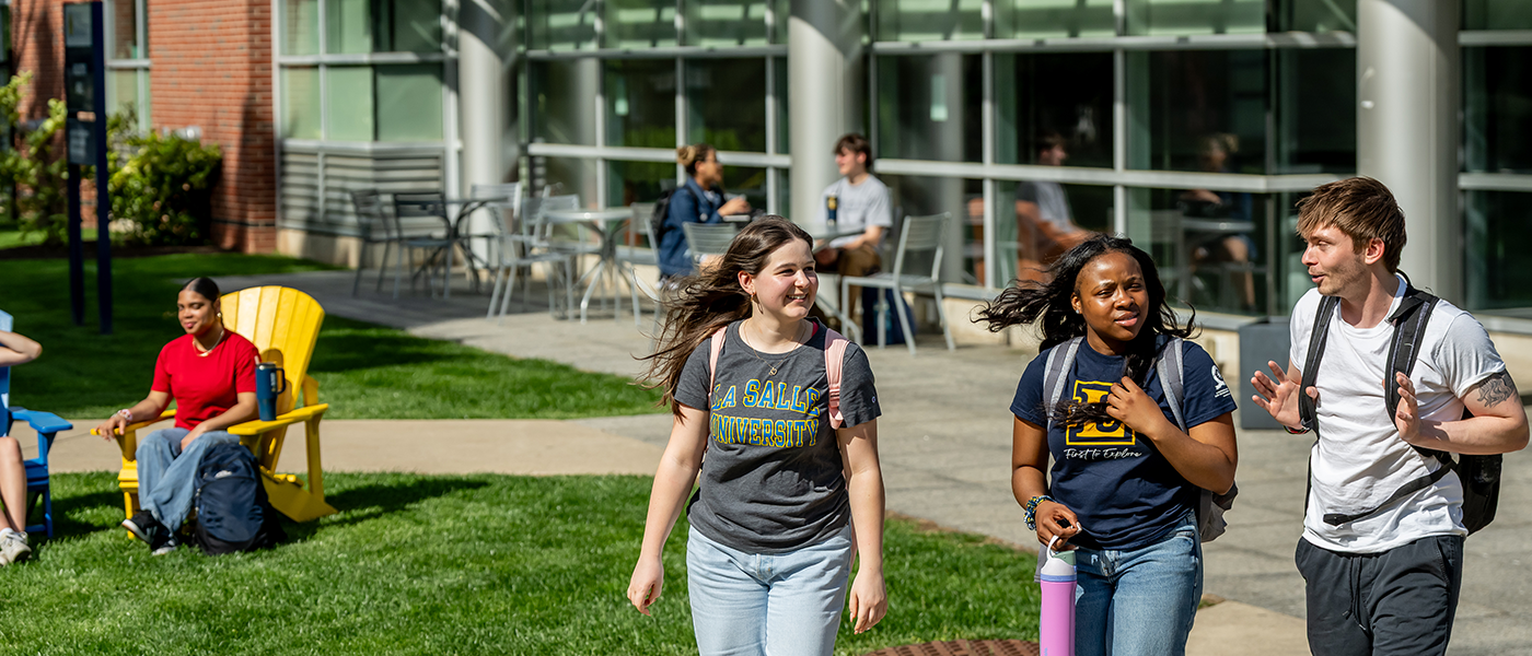 Image of students walking around campus