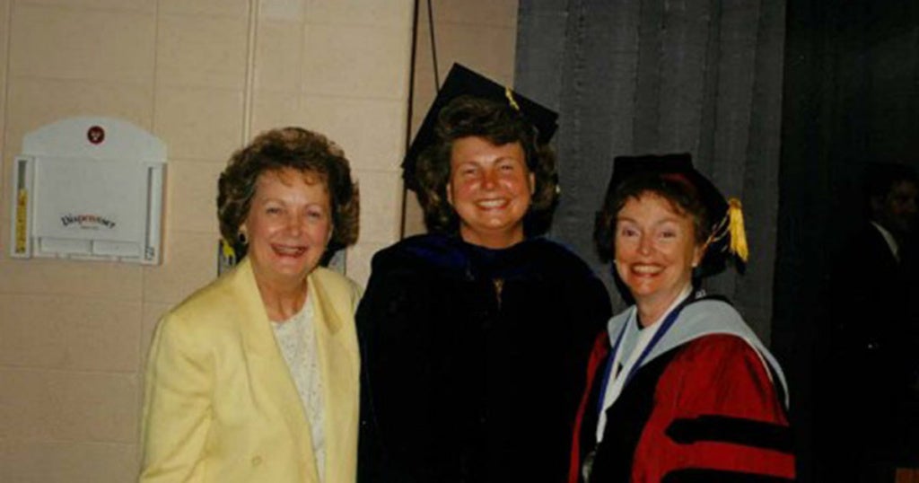 Beth Ann Swan (center) at her Ph.D. graduation.