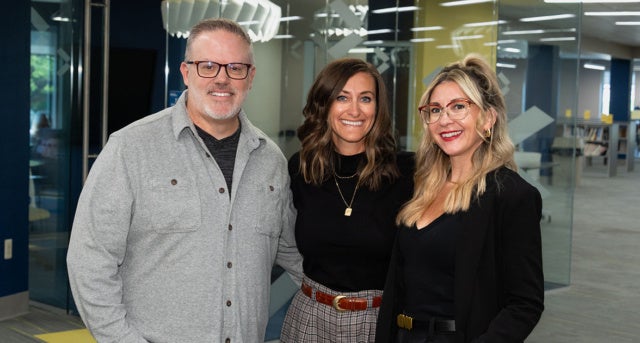 From left: Dennis Brown, '96, Danielle Hamra Hooker, '07, and Lindsey Massimiani Pepe, '07