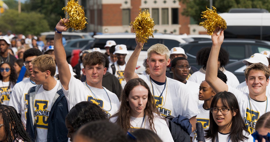 The newest Explorers make their way to the John E. Glaser Arena for New Student Welcome Convocation.