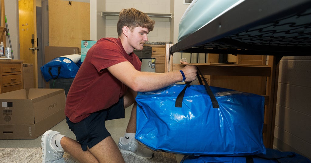 New Explorer Gabriel Sowa, '30, moving into his dorm.
