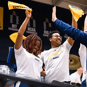 students cheering at a game