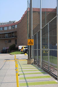 A new pedestrian walkway between the sports facilities on campus.