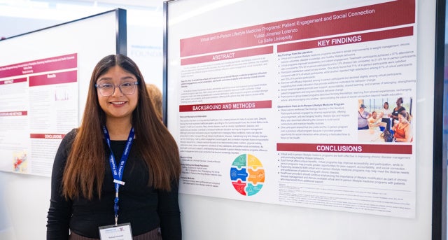 Yulisa Jimenez Lorenzo, '27, presents her research project completed as part of the IBX Foundation Nursing Internship Program.