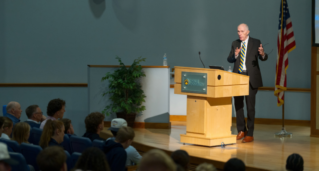 Robert Luddy speaks to students