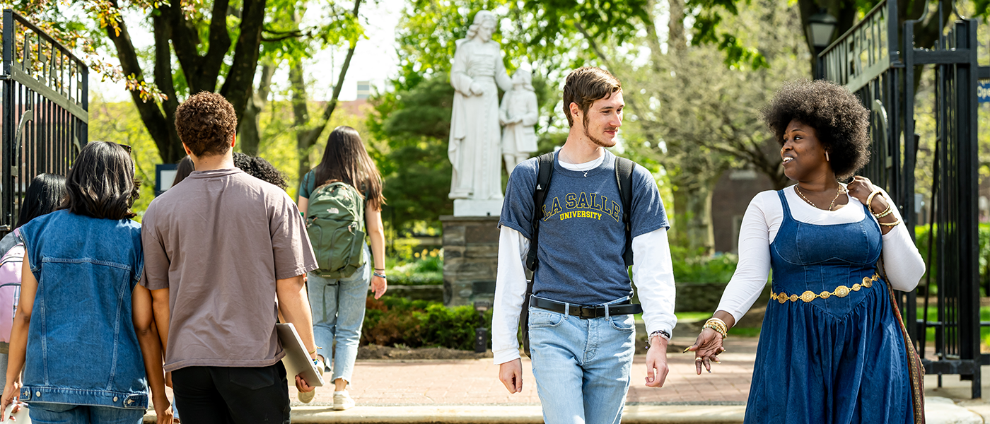 Image of students walking around La Salle's campus