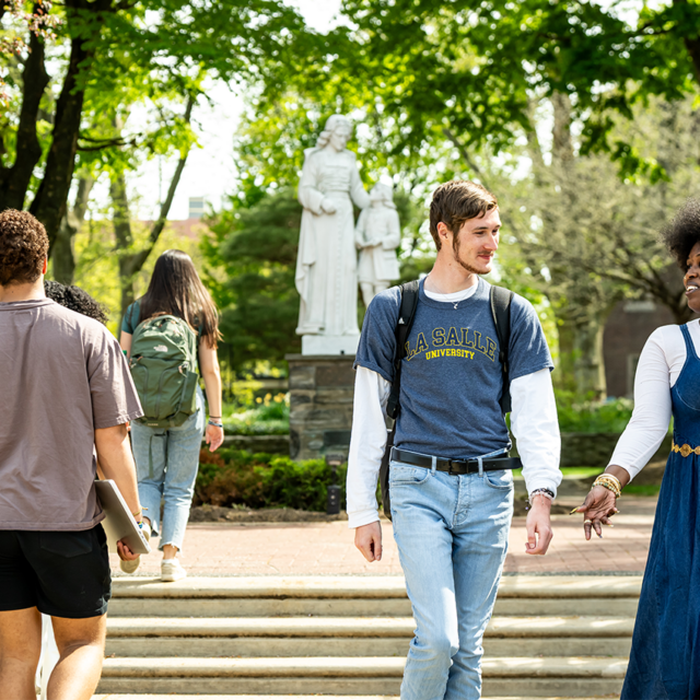 Image of students walking around La Salle's campus