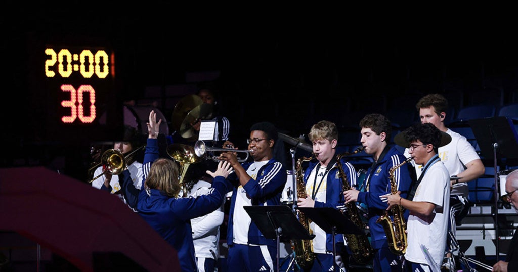 Dezlen Long, '27, (left) with the La Salle Pep Band.